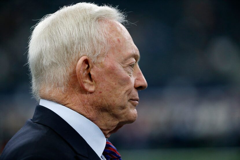 Dallas Cowboys owner Jerry Jones watches team warm up before Thursday's game against the...