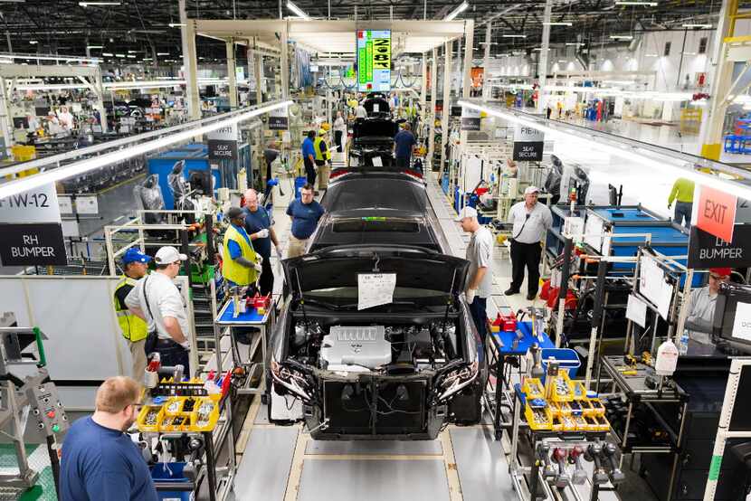 Camrys move along the assembly line in Toyota's plant in Georgetown, Ky. 