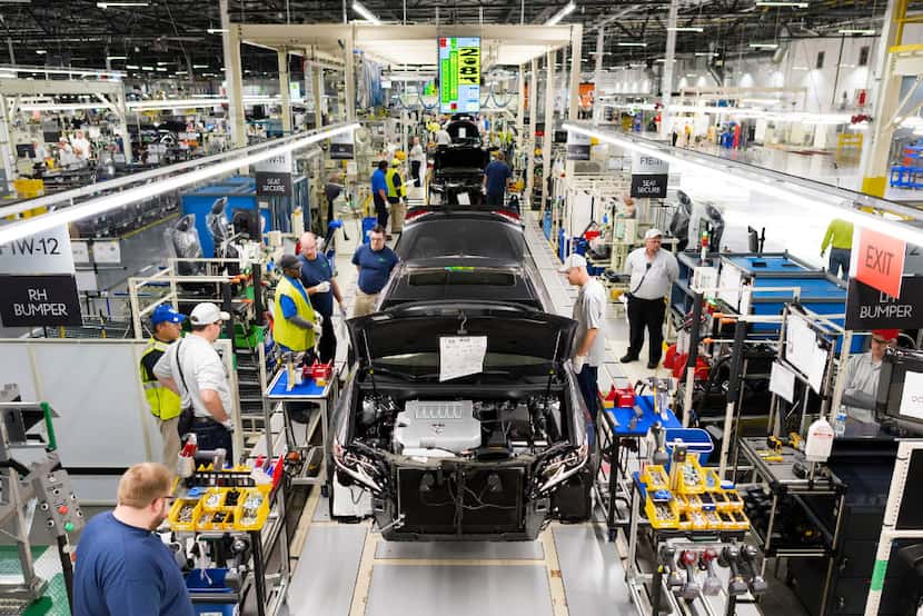 Camrys move along the assembly line in Toyota's plant in Georgetown, Ky. 