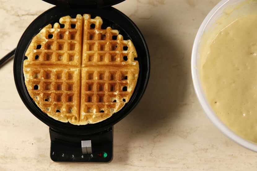 Scoop the desired amount of batter onto a greased and warmed waffle iron and cook until...