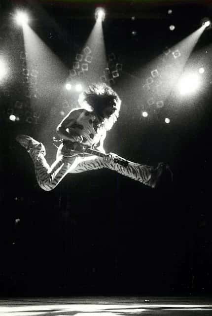 Eddie Van Halen leaps into the air at Reunion Arena in Dallas in July 1984.