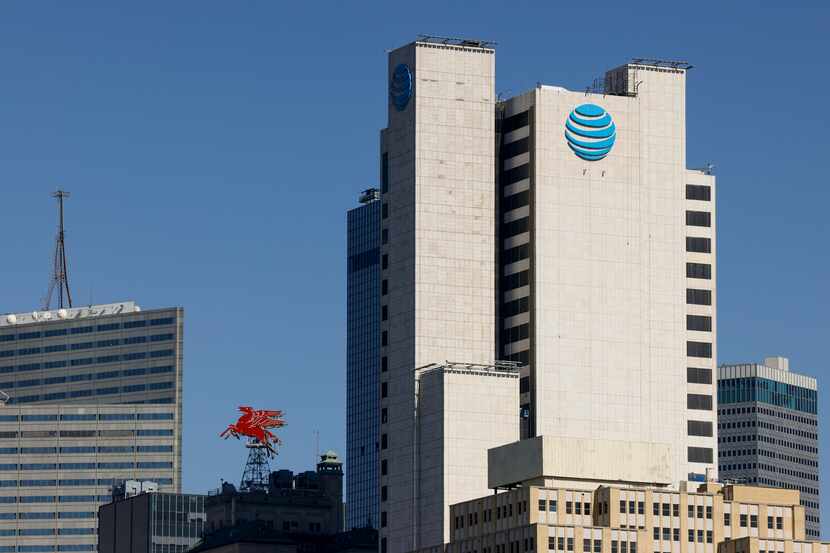 AT&T added 468,000 net new mobile subscribers in the third quarter, reversing four...