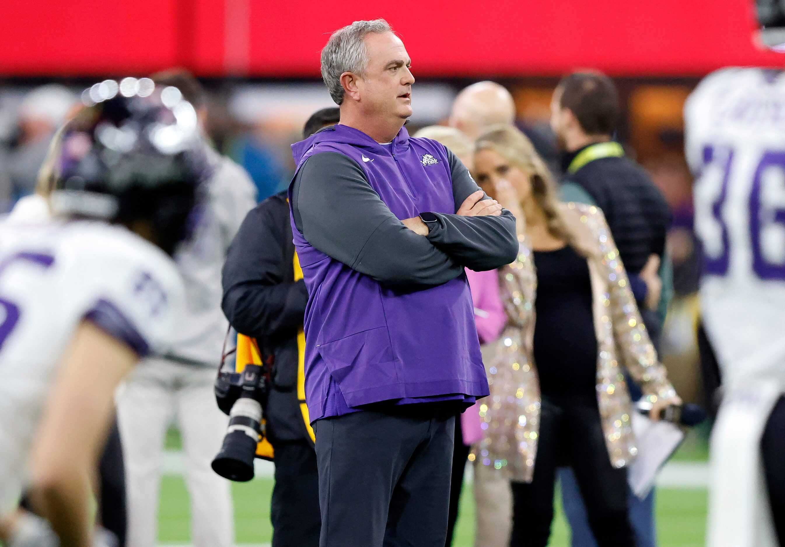 TCU Horned Frogs head coach Sonny Dykes watches his team warmup before facing the Georgia...