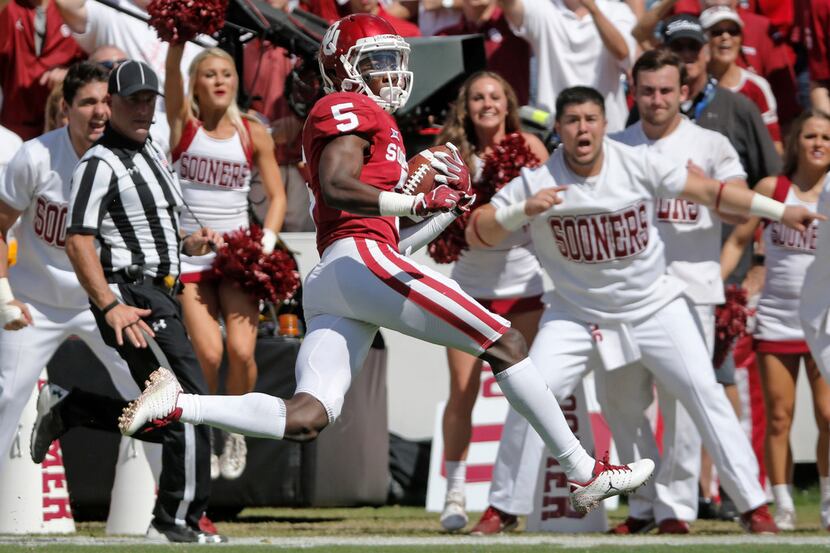 Oklahoma Sooners wide receiver Marquise Brown (5) heads to the end zone on a long touchdown...