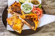 Hurtado Barbecue will sell birria quesadillas made with smoked brisket at Texas Rangers home...
