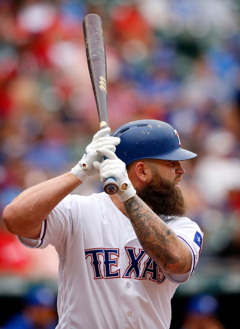 Texas Rangers batter Mike Napoli (5) waits for a pitch against the Toronto Blue Jays at...