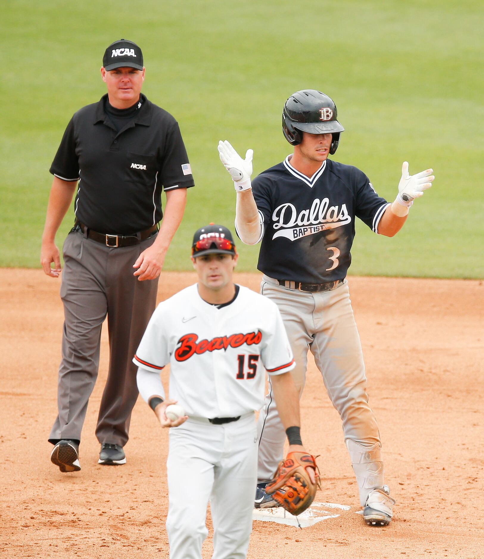 DBU’s Jackson Glenn (3) celebrates hitting an RBI double as Oregon St. infielder Kyle...