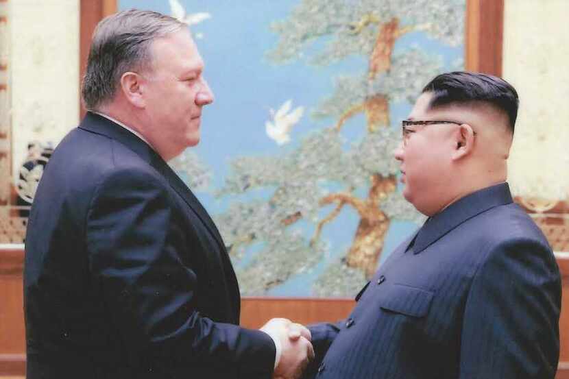 North Korean leader Kim Jong-Un (right) shakes hands with the former CIA Director, now US...