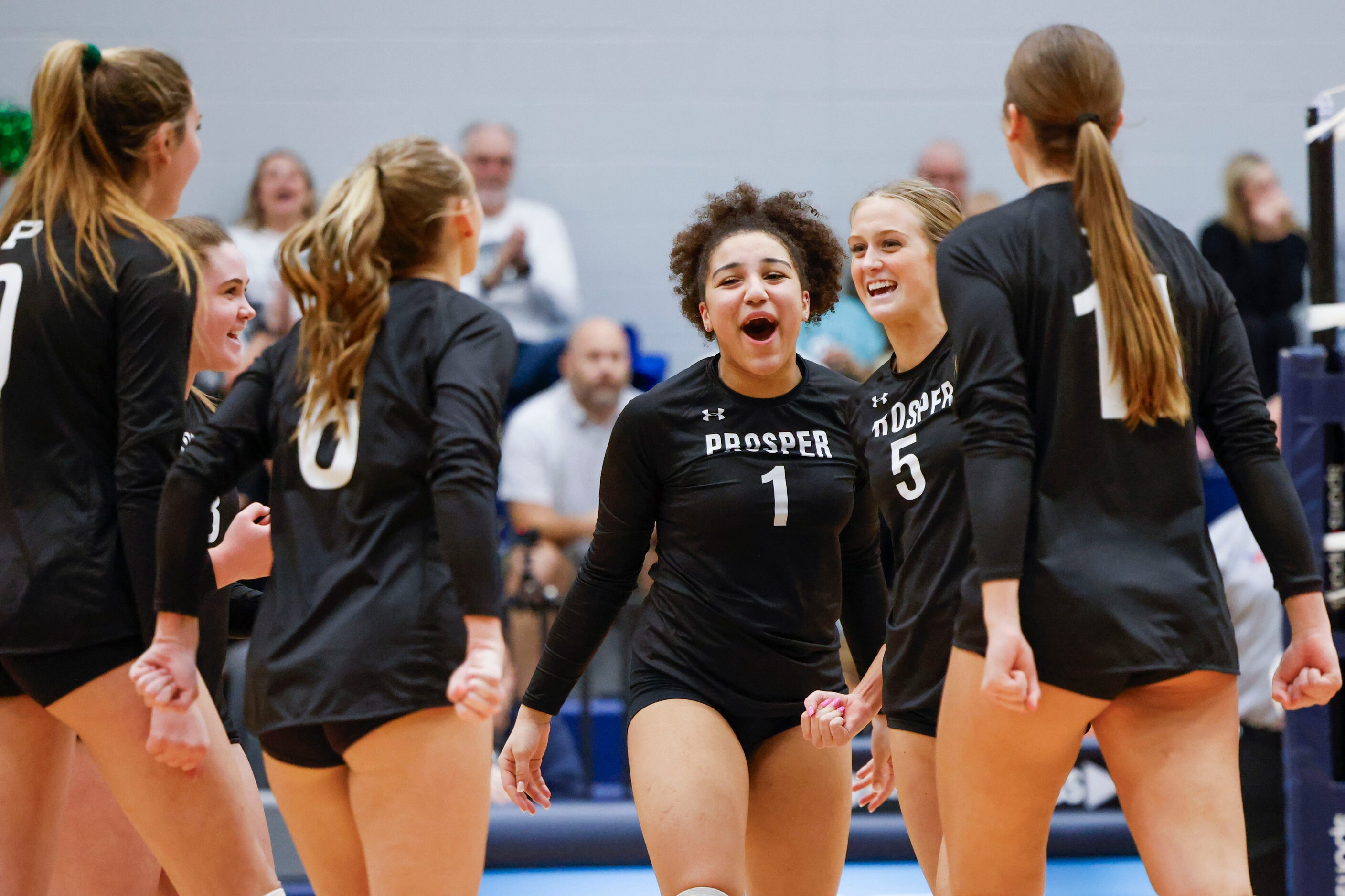 Prosper high school’s Jayla Jackson (1), Sydney Thornton (5) alongside other players...