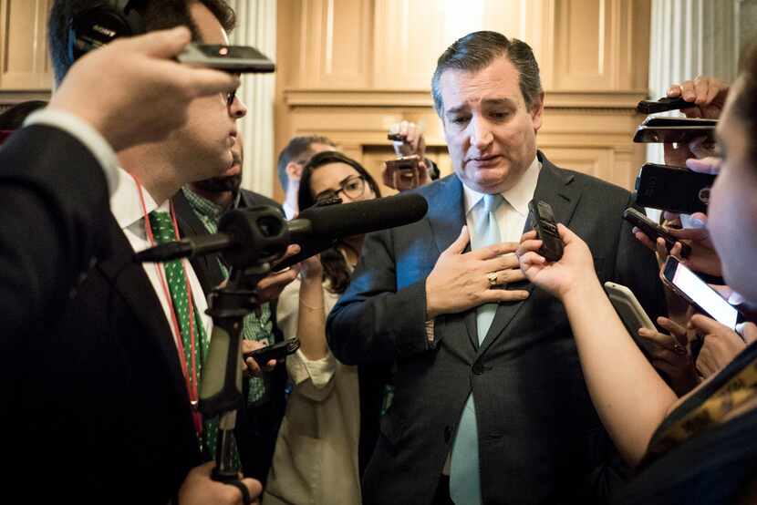 President Donald Trump says he doesn't like the idea by Sen. Ted Cruz (center) to hire more...
