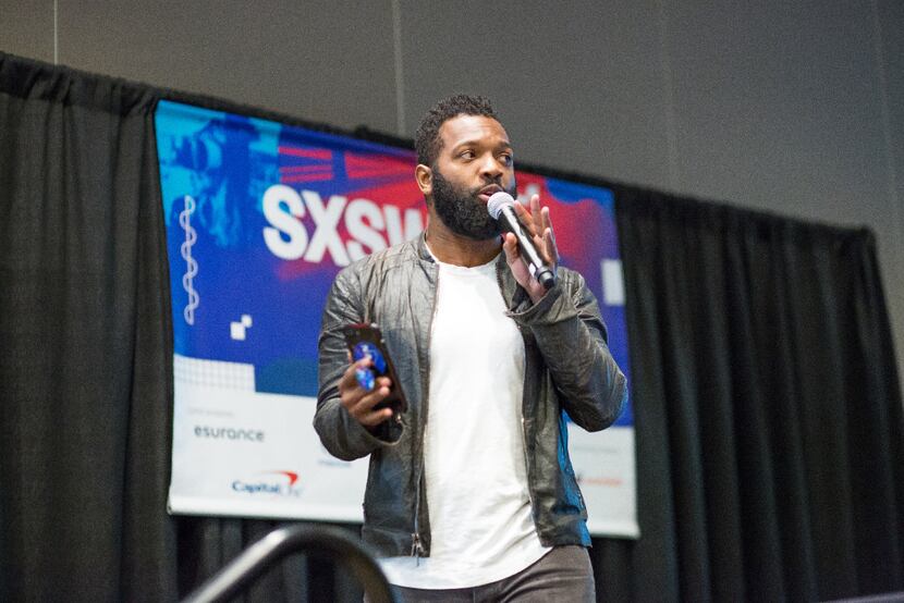 Baratunde Thurston, a futurist comedian and activist leads a session called "Head Fakes and...