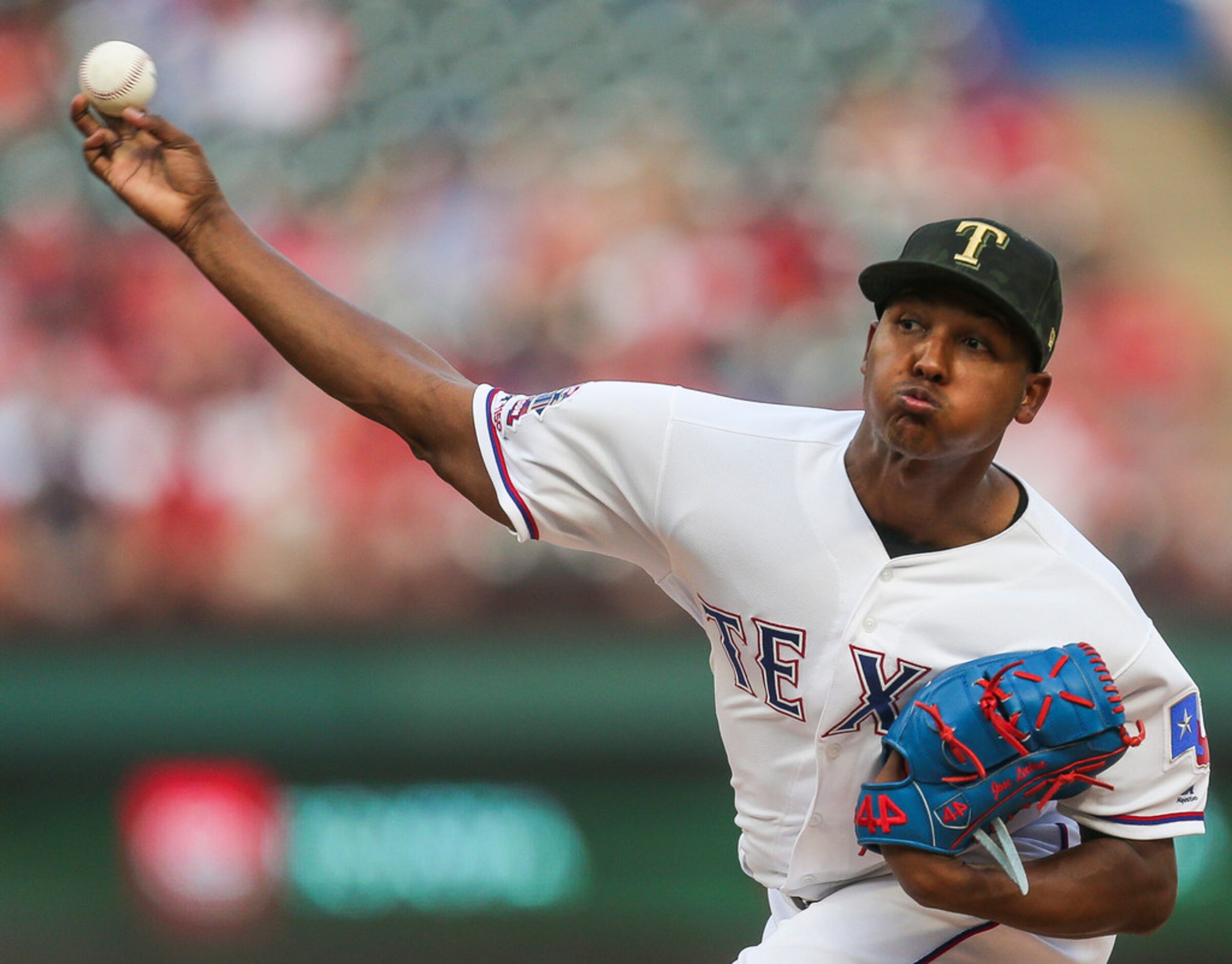 Texas Rangers starting pitcher Jose Leclerc (25) pitches during the top of the first inning...