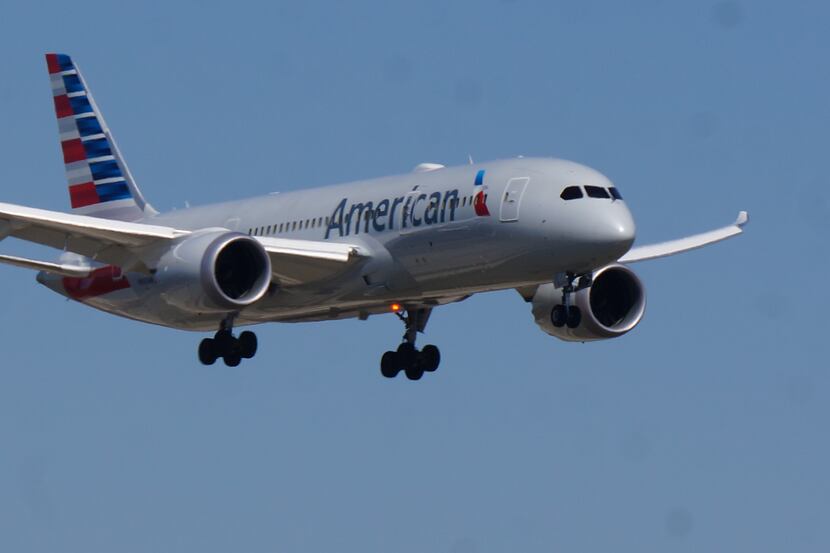  A Boeing 787 flown by American Airlines lands at D/FW Airport on one of its training...