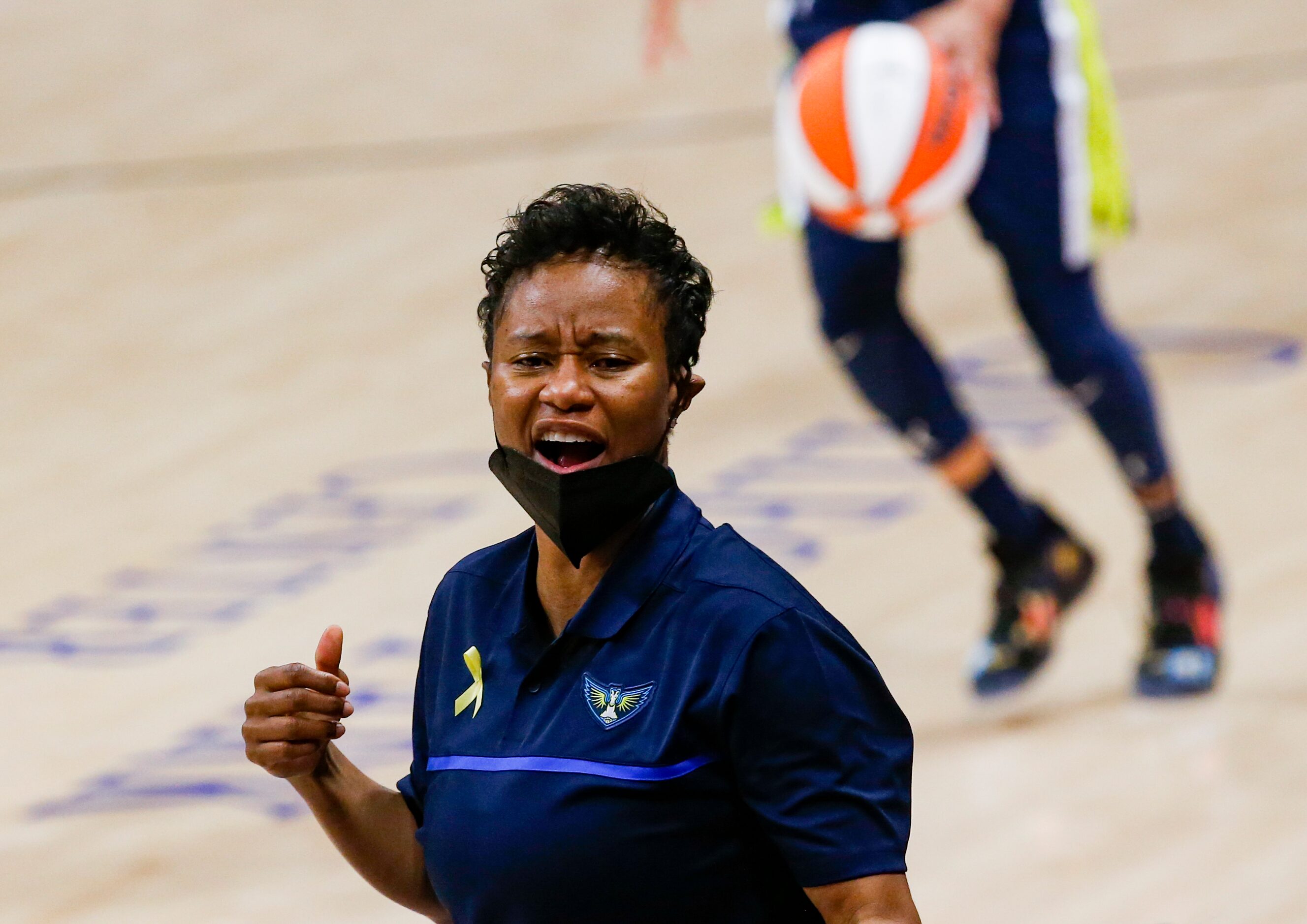 Dallas Wings coach Vickie Johnson on the sideline during the second quarter against the Los...