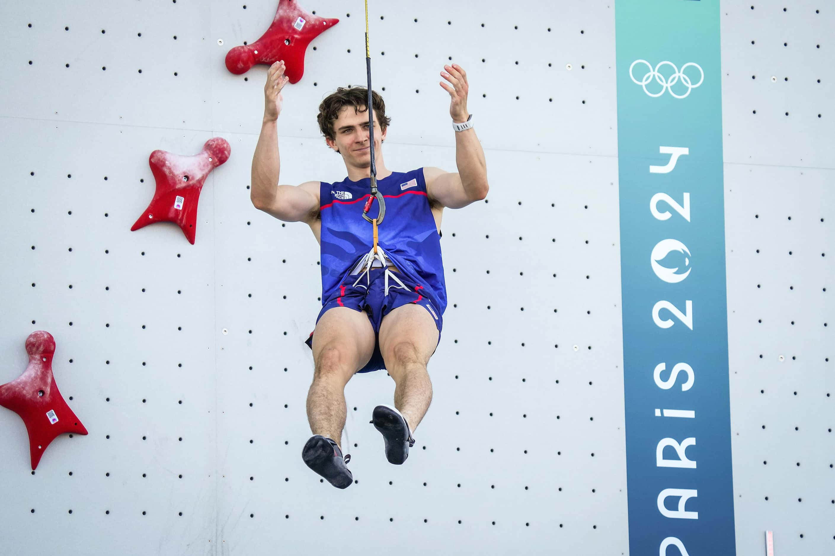 Sam Watson of the United States celebrates after breaking his own world record with a time...