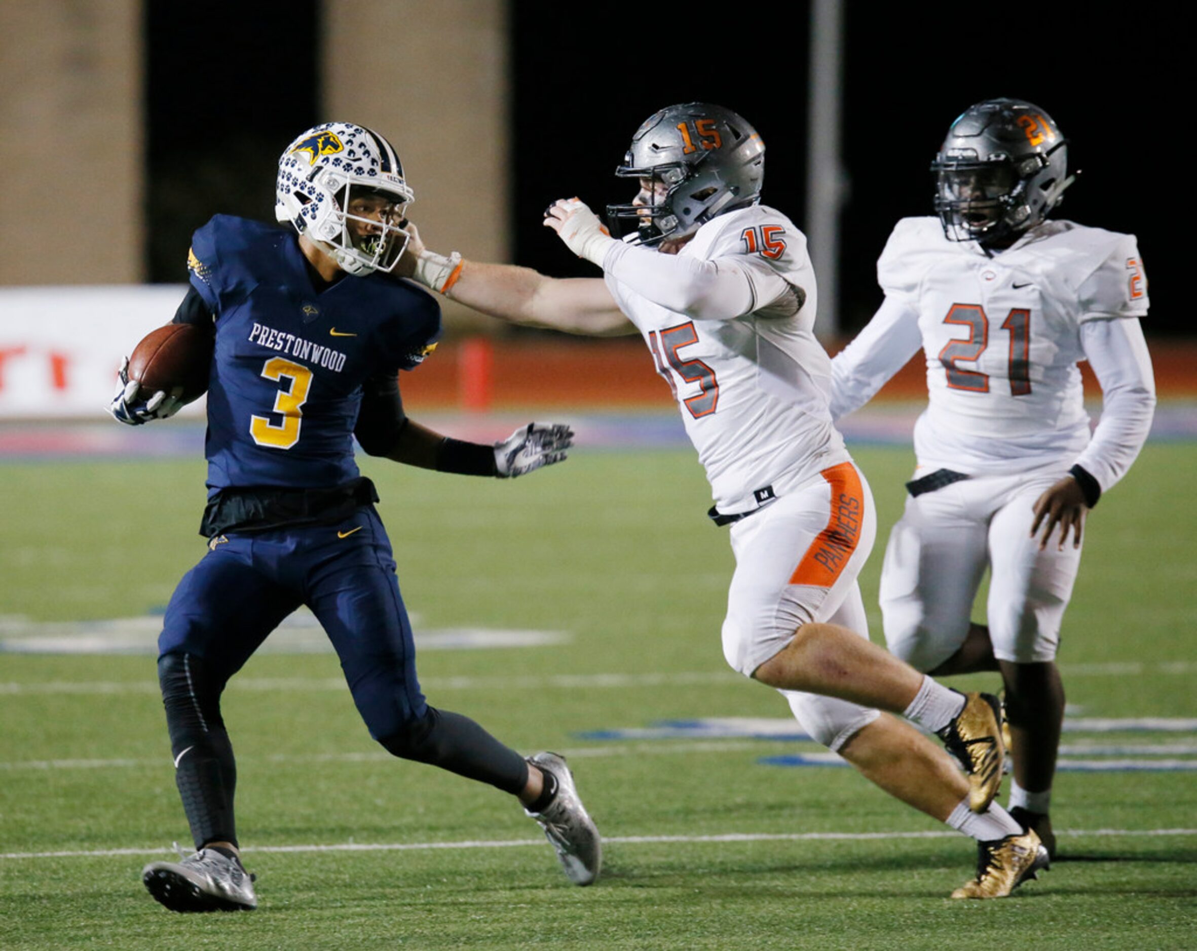 Prestwood Christian Academy Richard Baker (3) is tackled by St Pius X High School Ben Pierce...