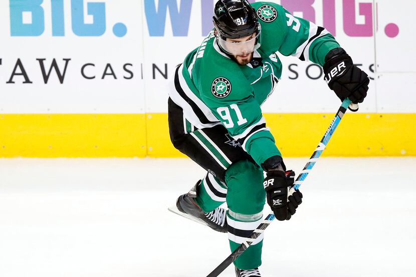 Dallas Stars center Tyler Seguin (91) passes the puck against the Los Angeles Kings during...