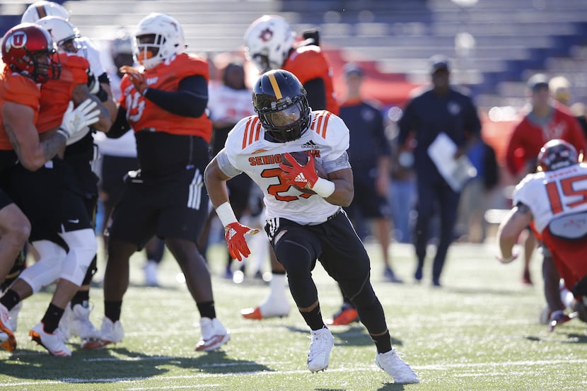 South Squad running back Ito Smith of Southern Mississippi (25) runs drills during the South...