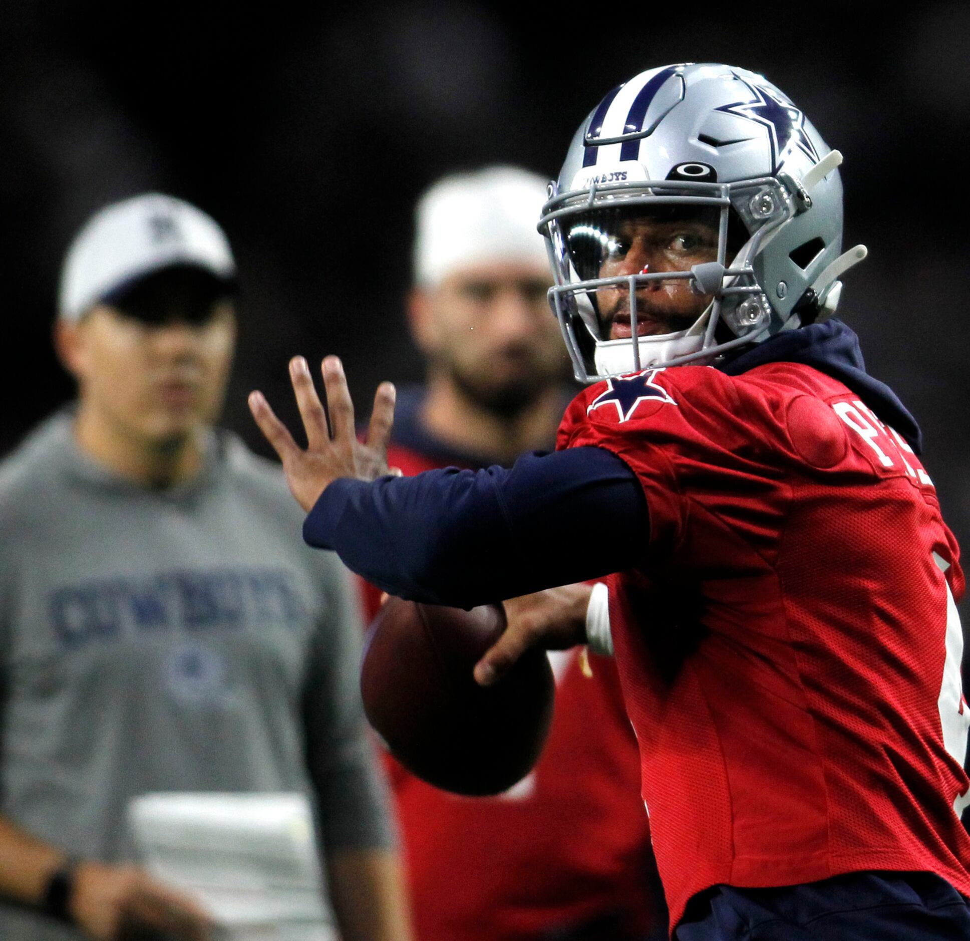 August 26, 2017: Dallas Cowboys quarterback Dak Prescott (4) warms up prior  to an NFL pre-season game between the Oakland Raiders and the Dallas  Cowboys at AT&T Stadium in Arlington, Texas. Shane