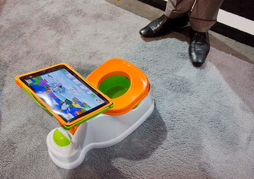 The iPotty for iPad potty training device is see on display at the Consumer Electronics...