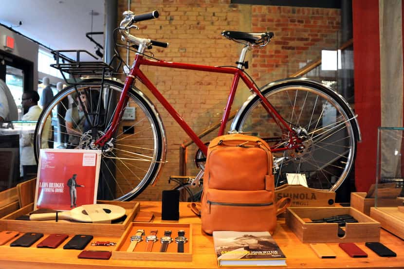 Bicycles, leather phone cases and watches are sold at the opening of Shinola in Plano, TX on...