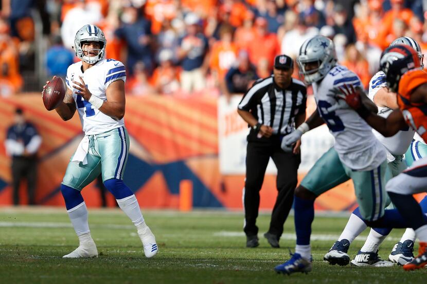 Dallas Cowboys quarterback Dak Prescott (4) looks to pass during the second quarter of play...