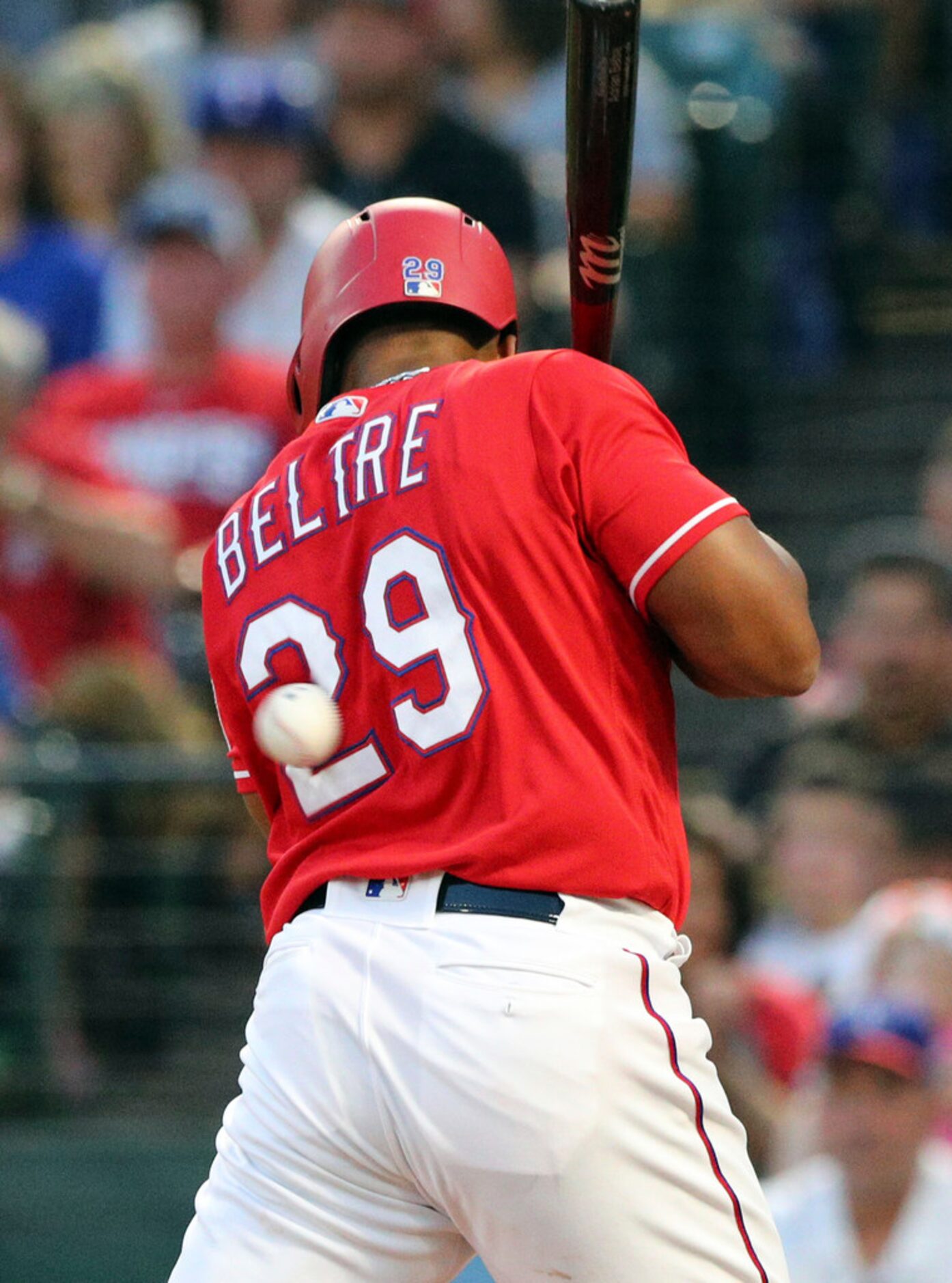 Texas Rangers' Adrian Beltre is hit by a pitch during the fourth inning of the team'...