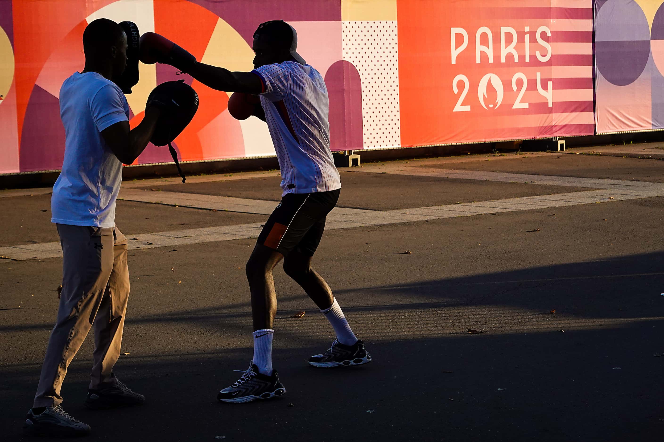 Ali Toure (right) works out with Sekou Traore outside the Stade de France, the venue for...
