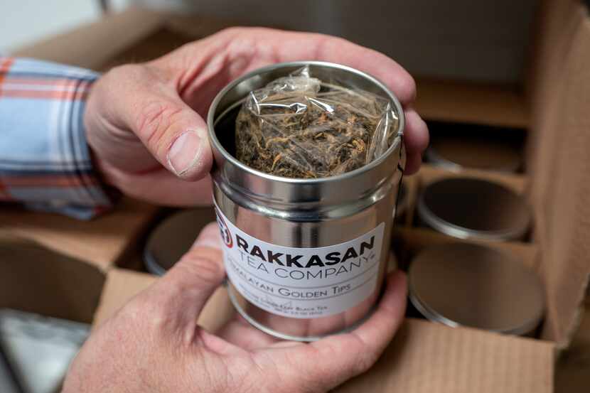 TK Kamauf holds a canister of Rakkasan Tea’s Himalayan Golden Tips, his favorite tea.