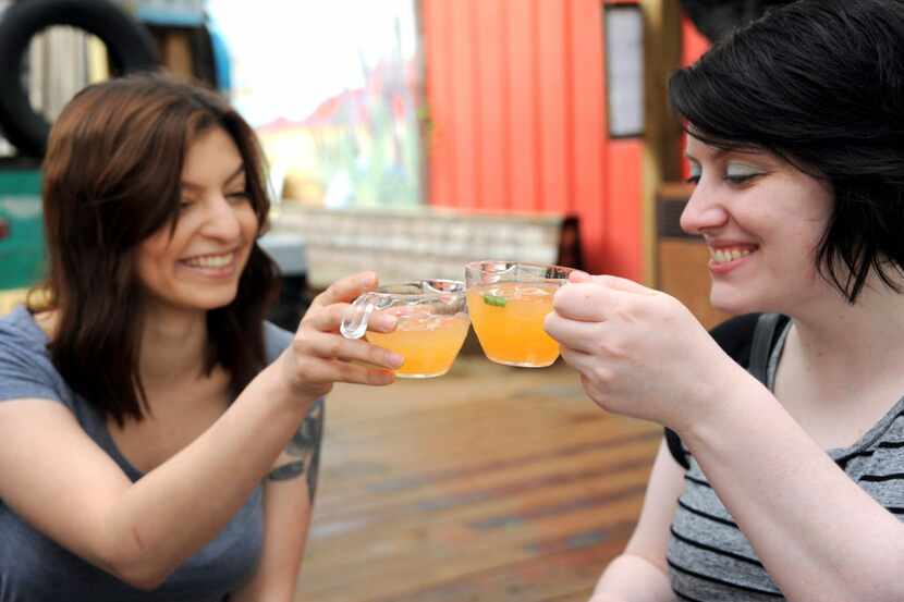 Grace Rozas and Christie Graves 'cheers' to the holiday weekend with brunch punch at Truck...