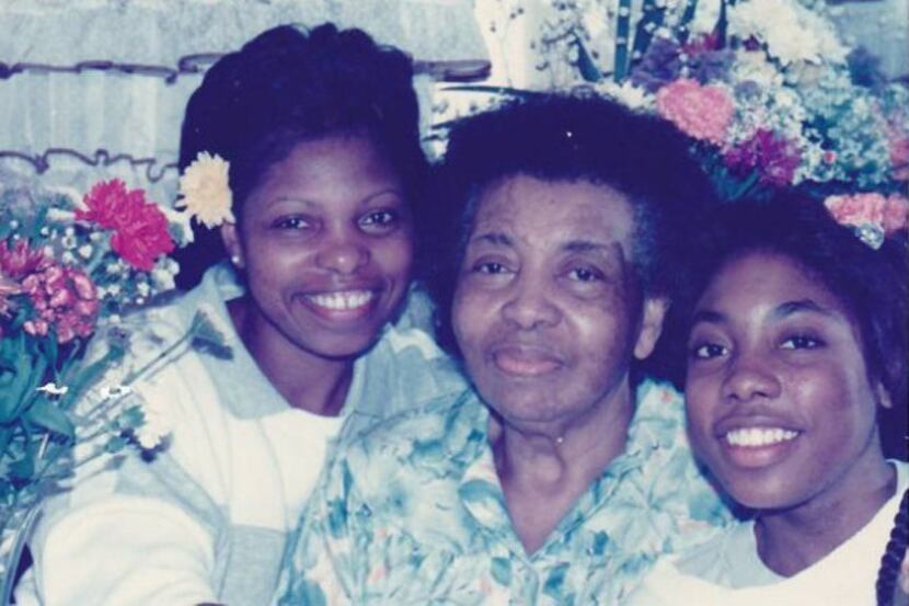 Myiesha Taylor with her mother and grandmother in a low-resolution photo. From left to right...