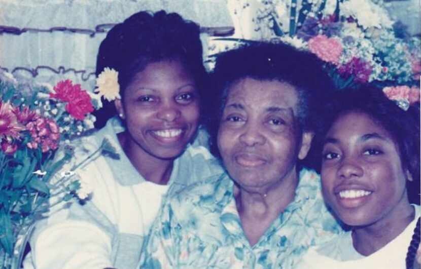 Myiesha Taylor with her mother and grandmother in a low-resolution photo. From left to right...