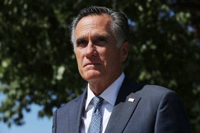 WASHINGTON, DC - SEPTEMBER 22: Sen. Mitt Romney (R-UT) leaves a meeting of GOP senators at...