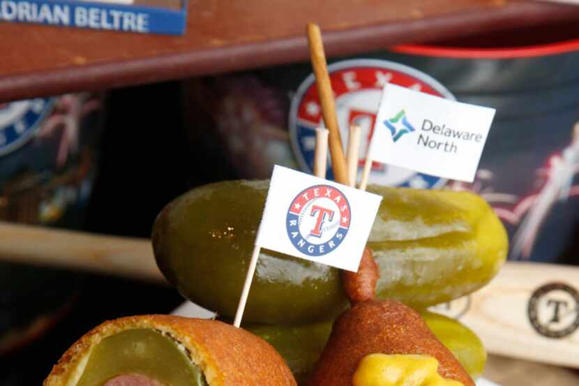 The dilly dog is offered as one of the Texas Rangers new menu items for the season at Globe...