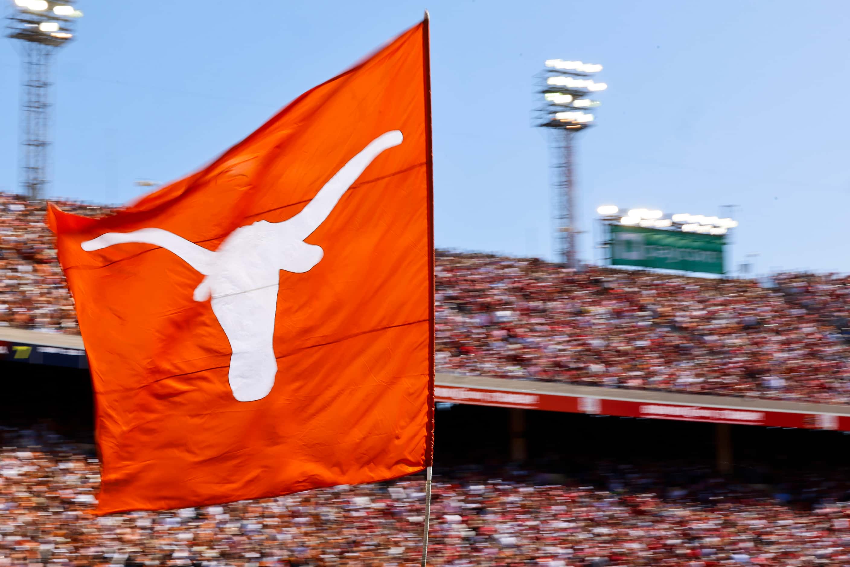 The longhorn flag goes around during the Red River Rivalry  at the Cotton Bowl, on Saturday,...