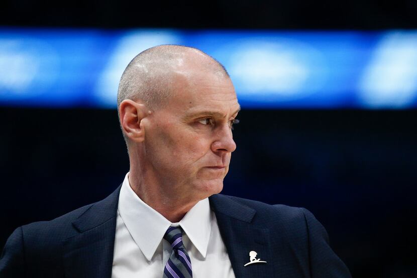 Dallas Mavericks head coach Rick Carlisle watches game action during the first half of an...