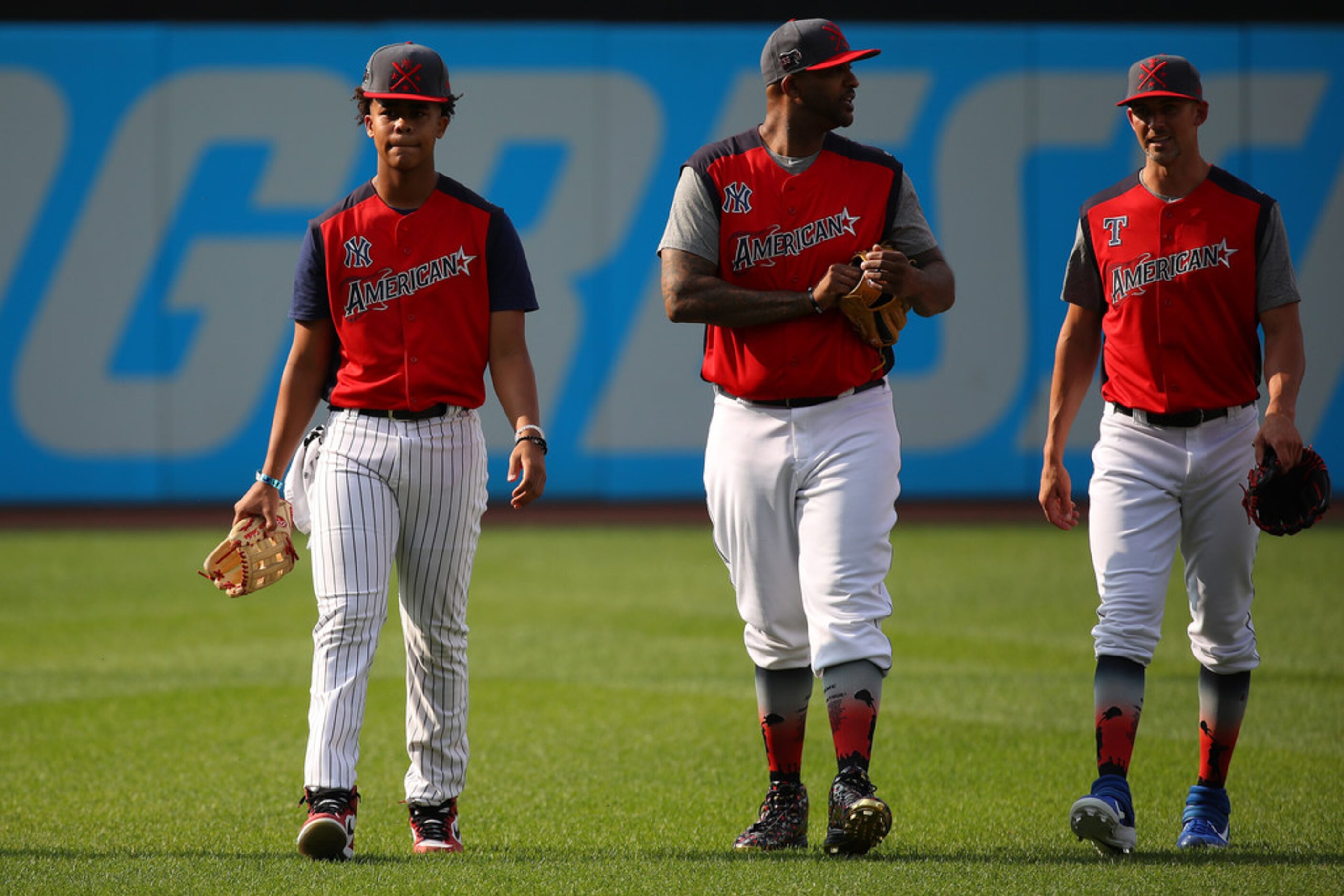 CLEVELAND, OHIO - JULY 08: (Center and R) CC Sabathia of the New York Yankees, Mike Minor of...