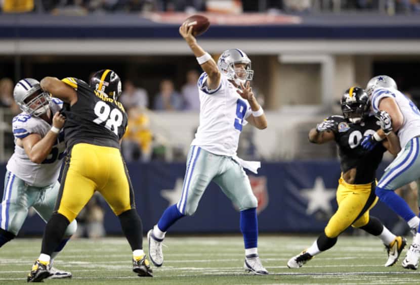 Dallas Cowboys quarterback Tony Romo (9) looks to pass in a game against the Pittsburgh...