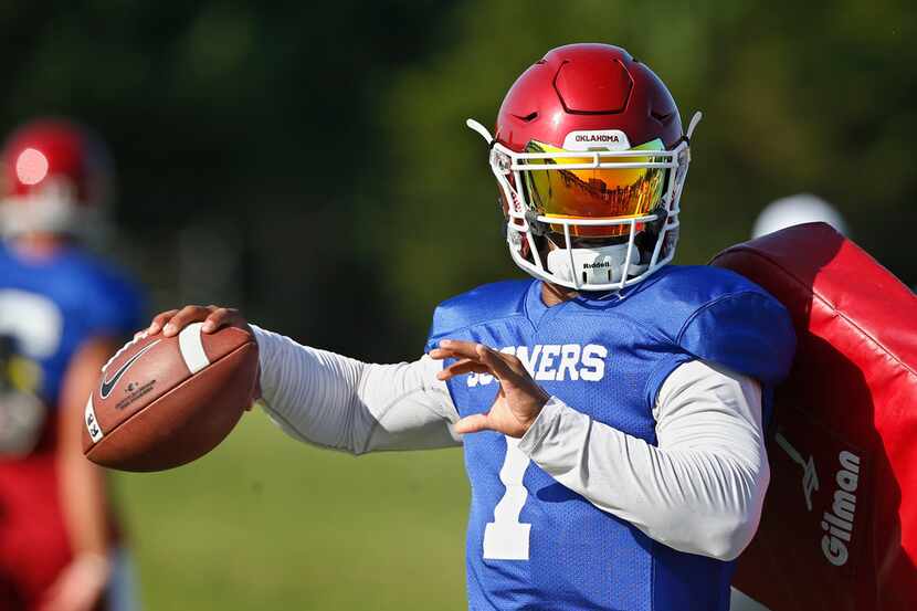 FILE - In this Monday, Aug. 6, 2018, file photo, Oklahoma quarterback Kyler Murray (1)...