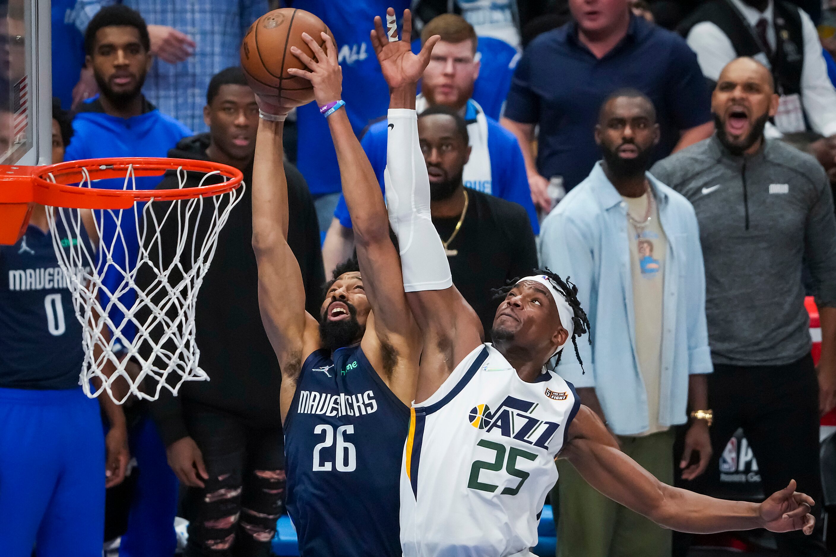 Dallas Mavericks guard Spencer Dinwiddie (26) grabs a defensive rebound away from Utah Jazz...