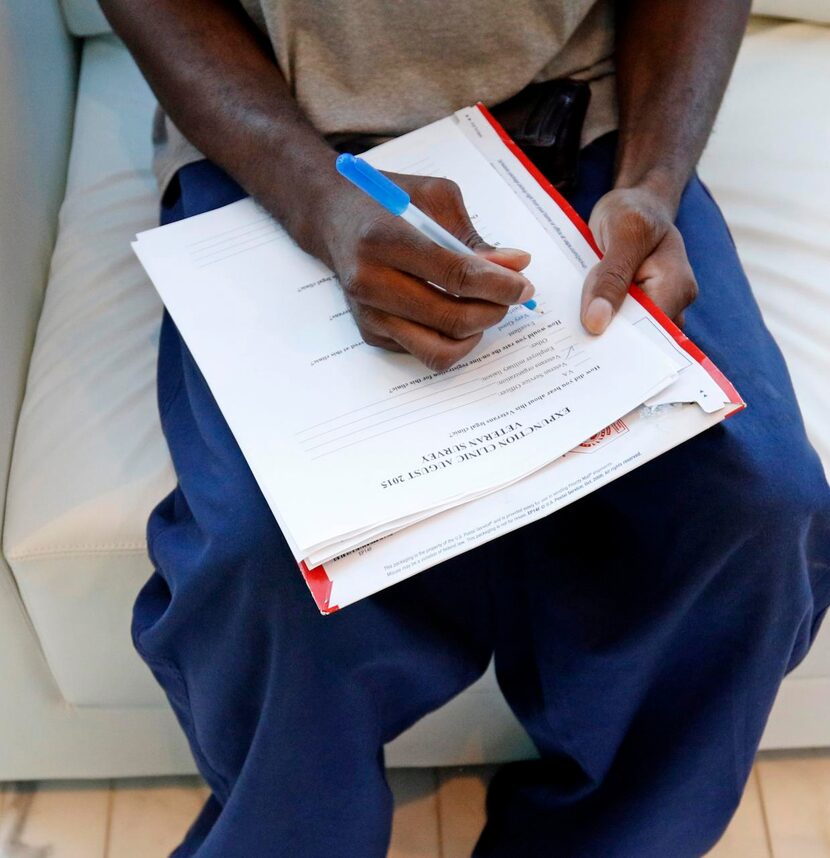 
Veteran Simeon Bradley fills out a questionnaire during the Metroplex Veterans Legal...