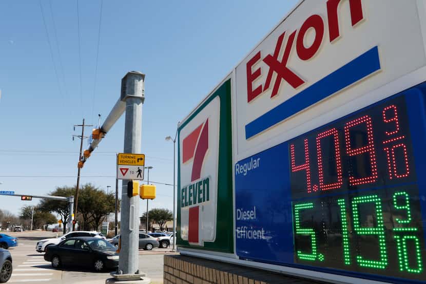 Gas prices are shown on March 9, 2022, at an Exxon- 7-Eleven convenience store at the...
