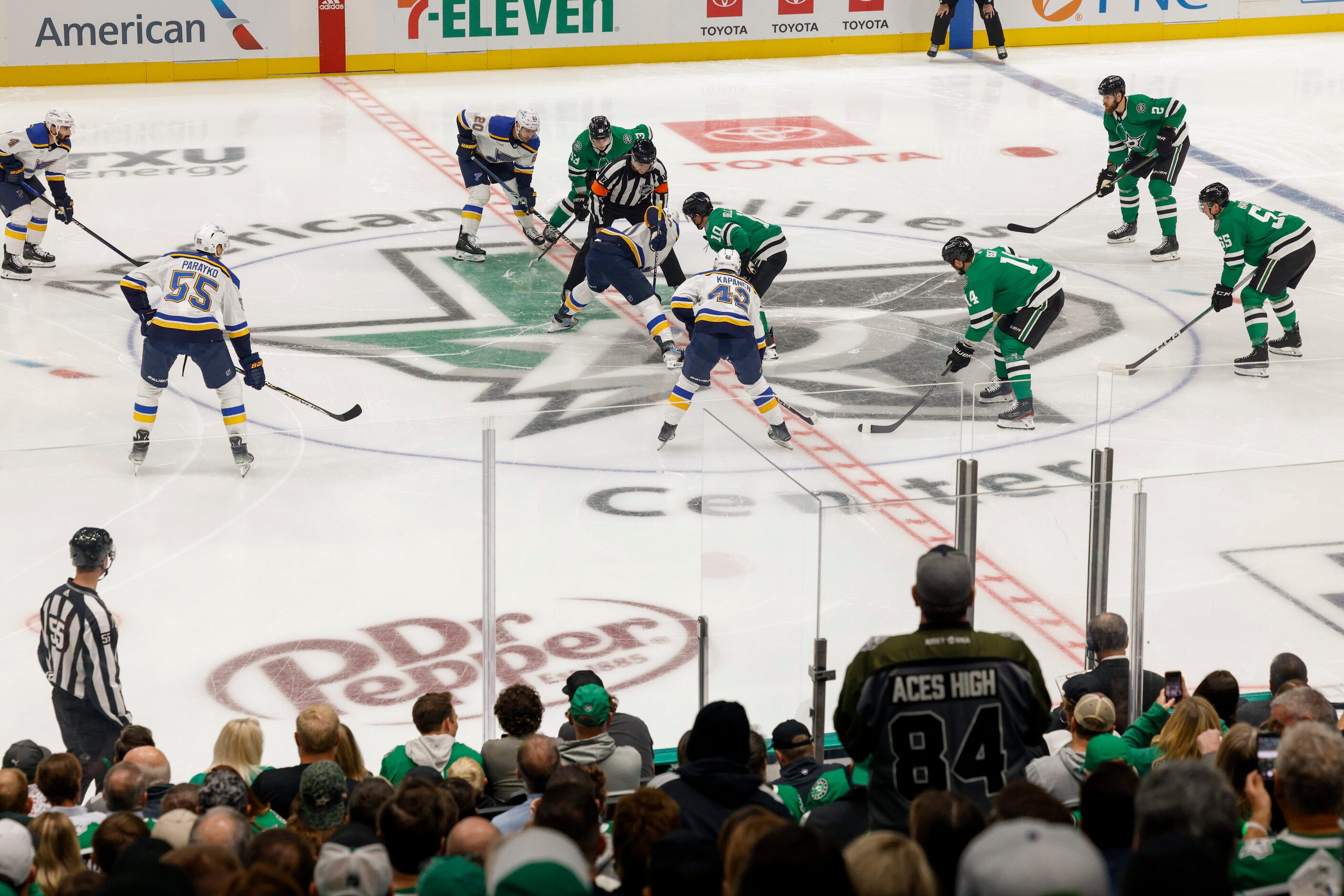 Fans stand and cheer as Dallas Stars center Ty Dellandrea (10) and St. Louis Blues center...