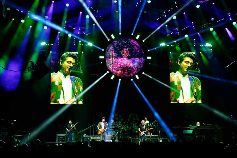 John Mayer (on screen), Bob Weir and others perform with Dead and Company, a Grateful Dead...
