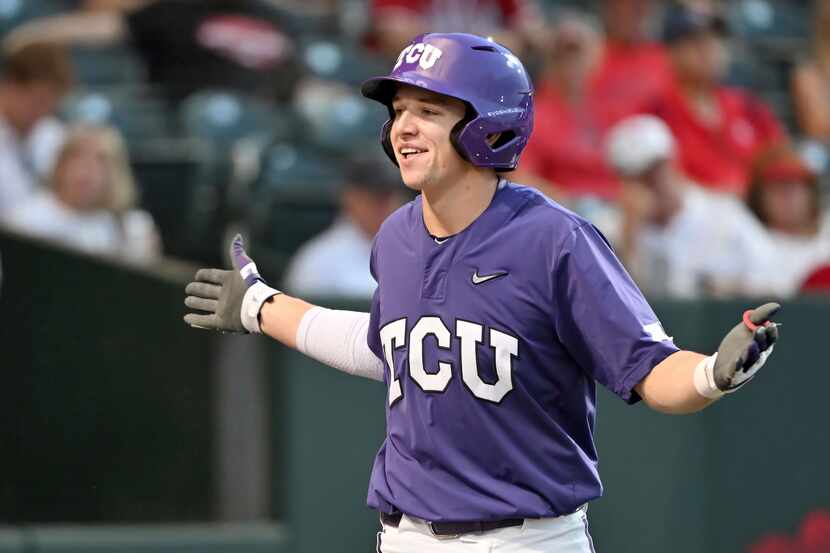 FILE - TCU batter Brayden Taylor celebrates after hitting a home run against Arizona during...