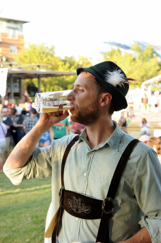Luke Cagle enjoys a beer at Oktoberfest in Addison Circle Park in Addison, TX on September...