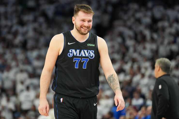 Dallas Mavericks guard Luka Doncic (77) smiles during the second half in Game 2 of the NBA...