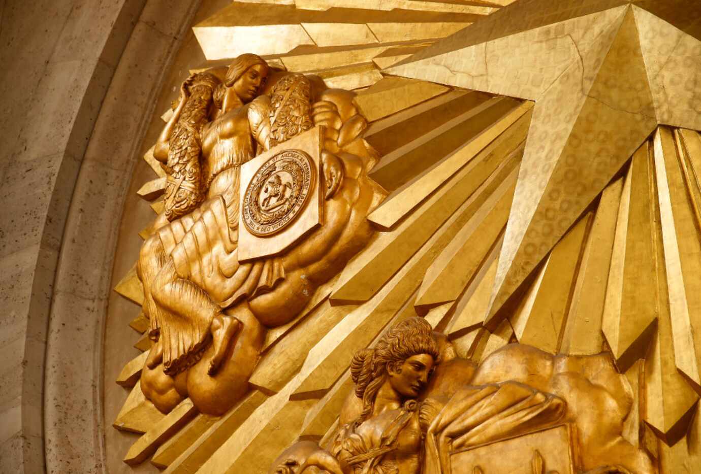Part of Fair Park's Hall of State gold-leafed medallion represents the Confederacy as part...