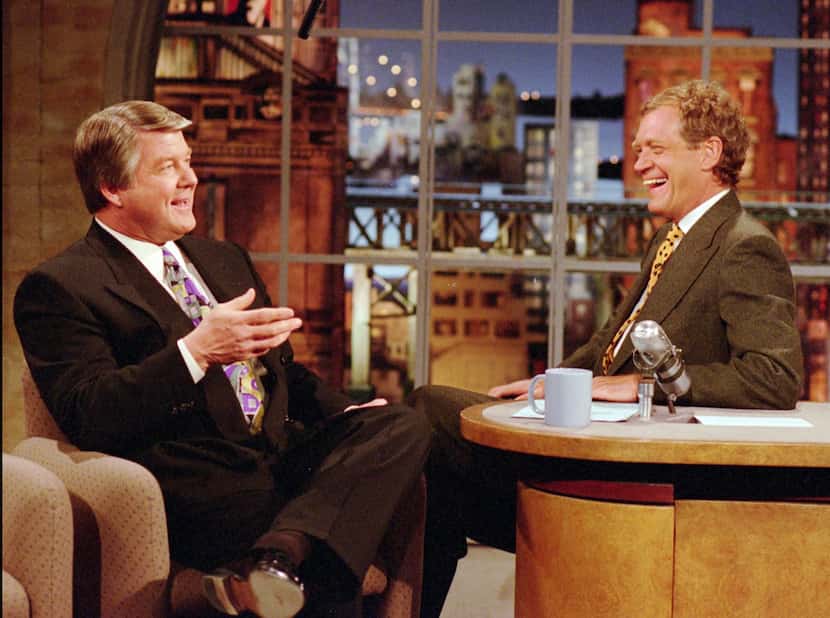 Dallas Cowboys head coach Jimmy Johnson chats with David Letterman during the taping of CBS'...