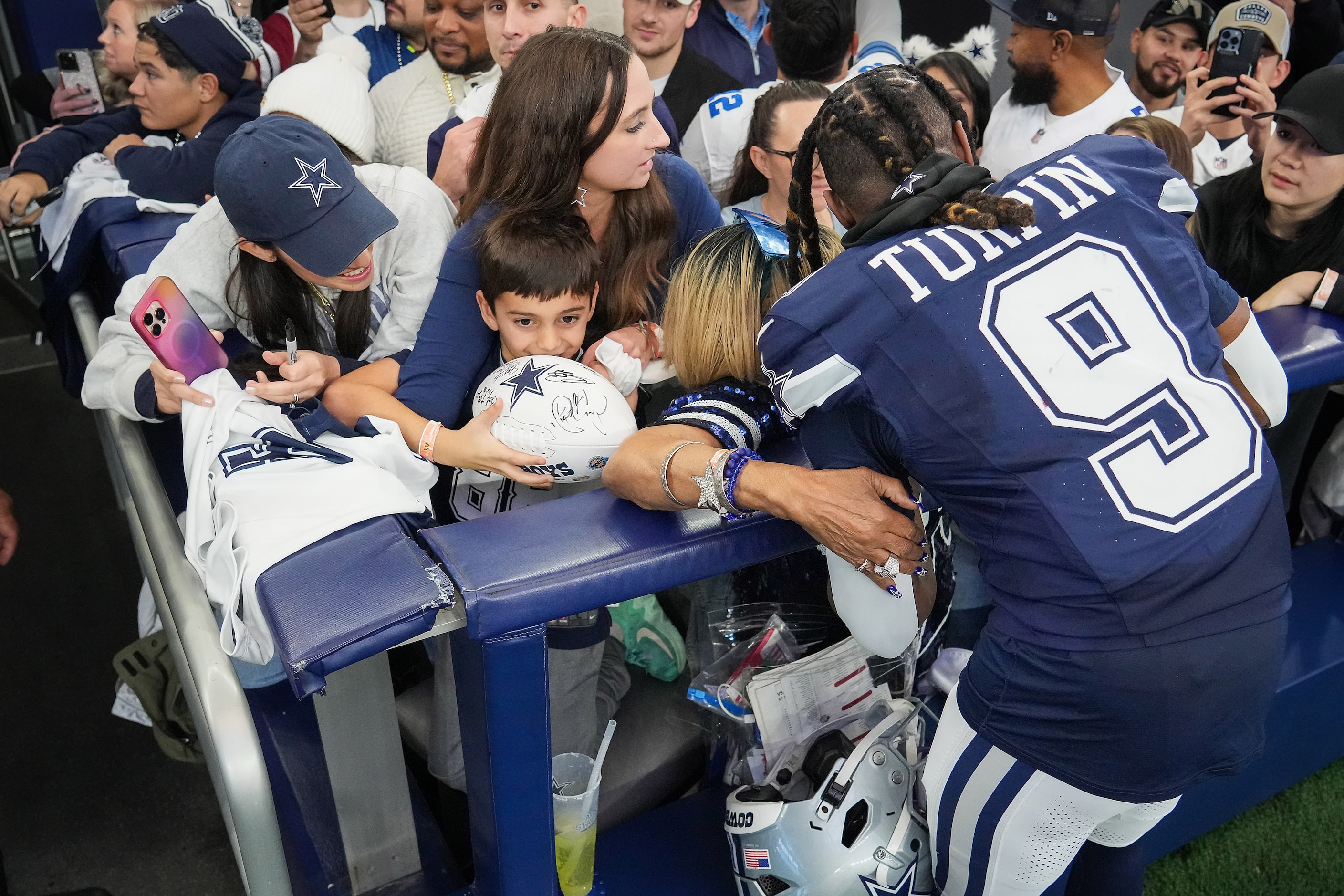 Dallas Cowboys wide receiver KaVontae Turpin signs autographs after a loss to the Washington...